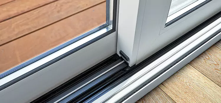 Why Your Sliding Door Keeps Getting Stuck in Okemos, MI?